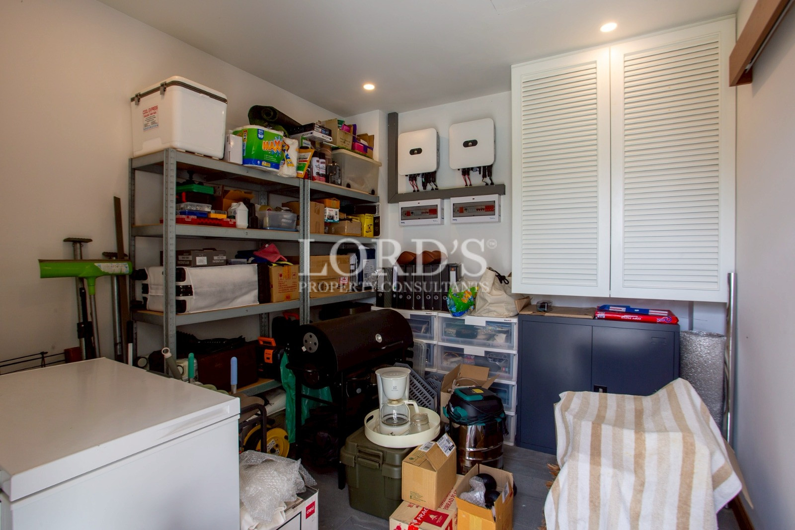 Storage room with shelves and household items