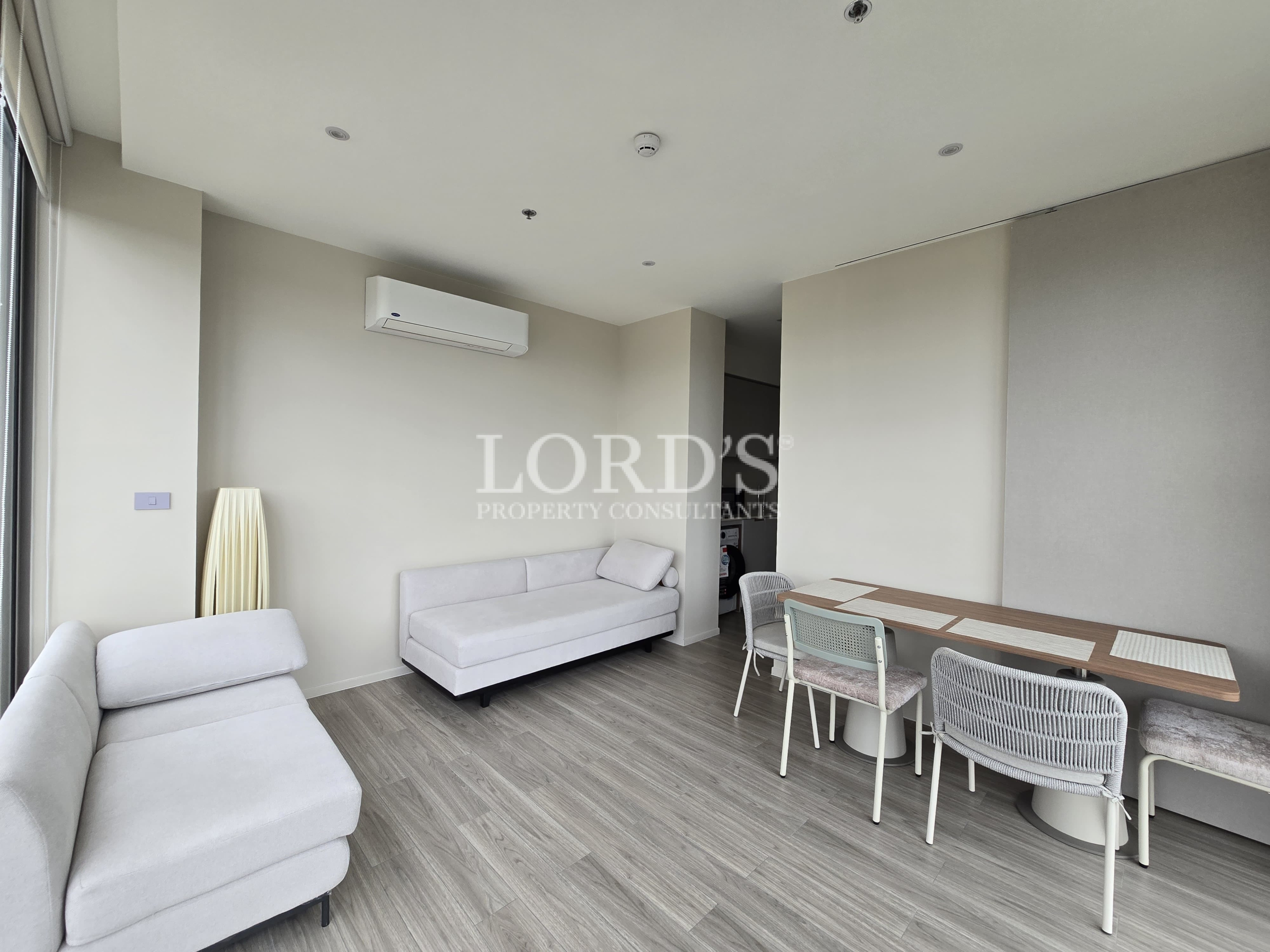 Minimalist dining area with white furniture