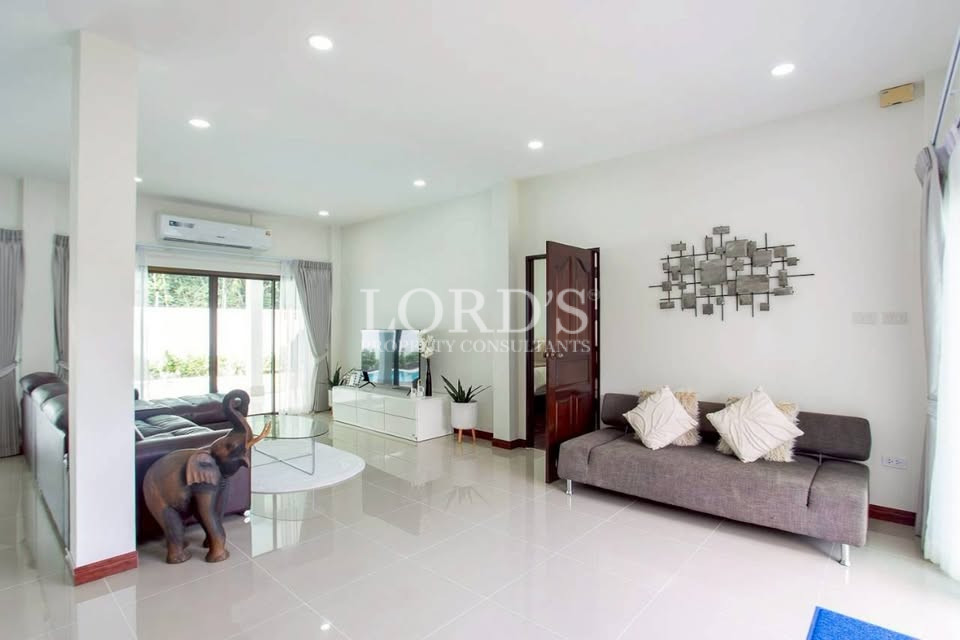 Open-plan living area with large glass doors