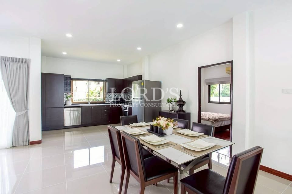 Modern kitchen with island and recessed lighting
