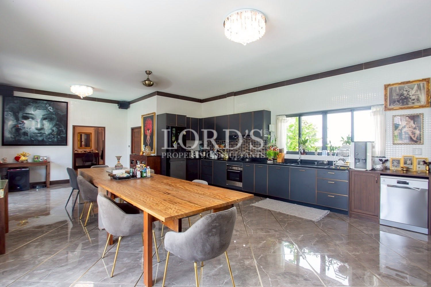 Open-plan kitchen with dining table