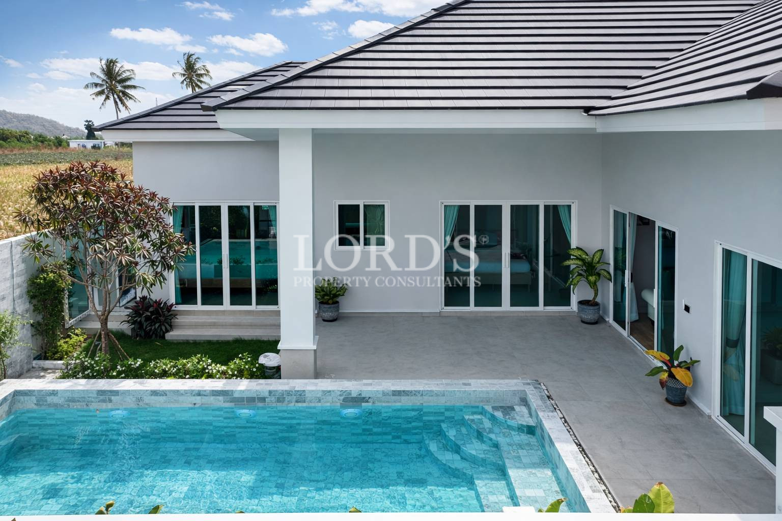 235641_0 Modern villa facade with pool entrance