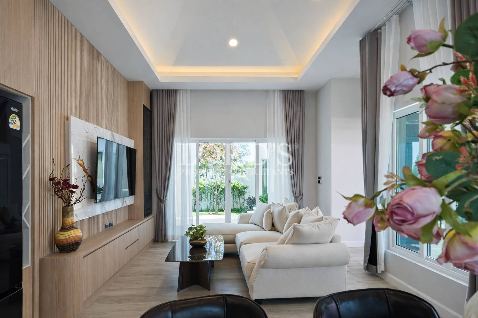 Bright lounge with garden-view windows