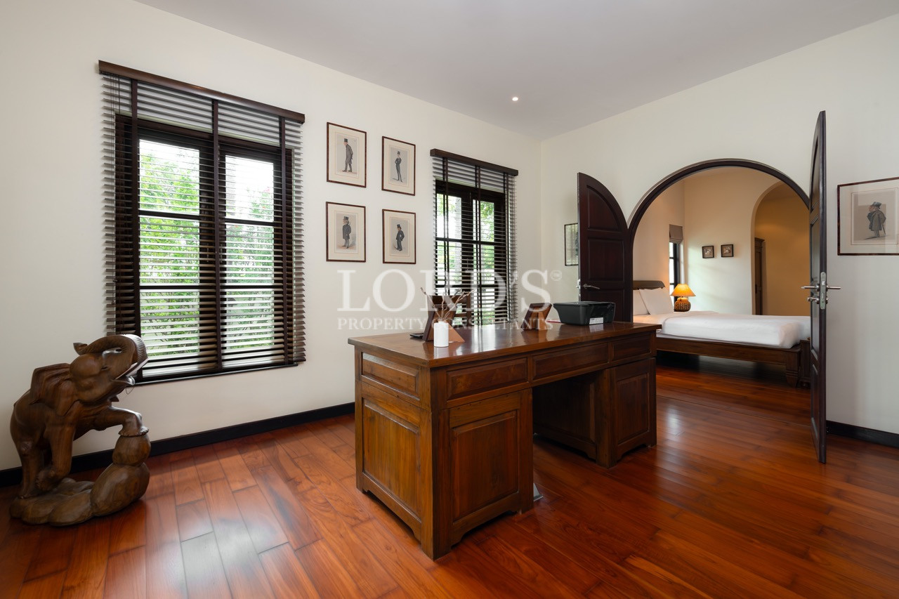 Living room with dining area and artwork