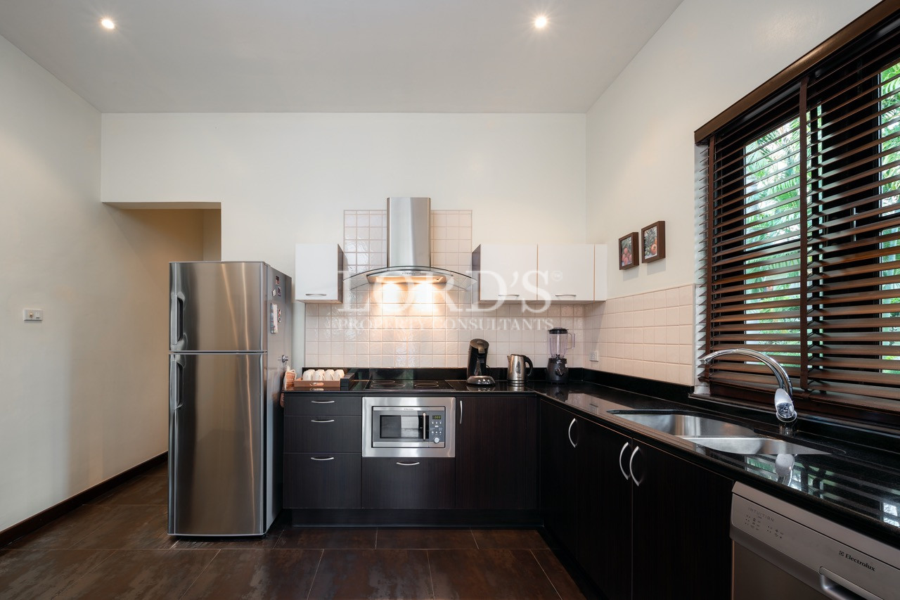 Kitchen with island and stainless appliances