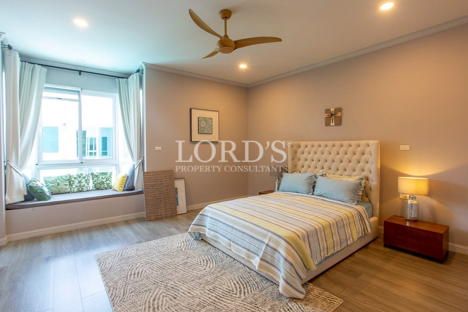Bedroom with upholstered headboard