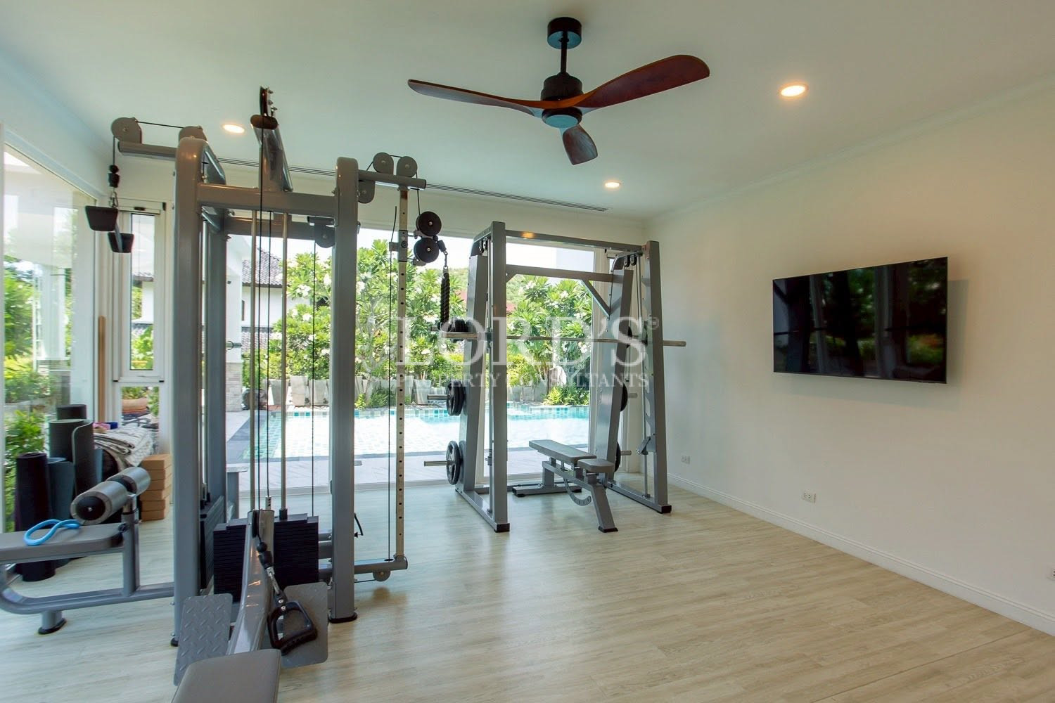Living room with floor-to-ceiling glass doors