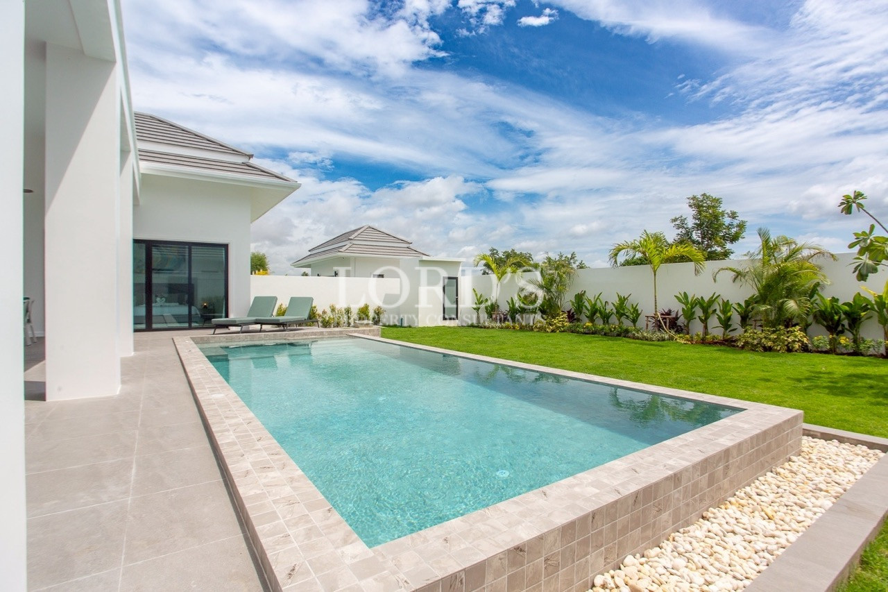 Luxury villa with landscaped front yard