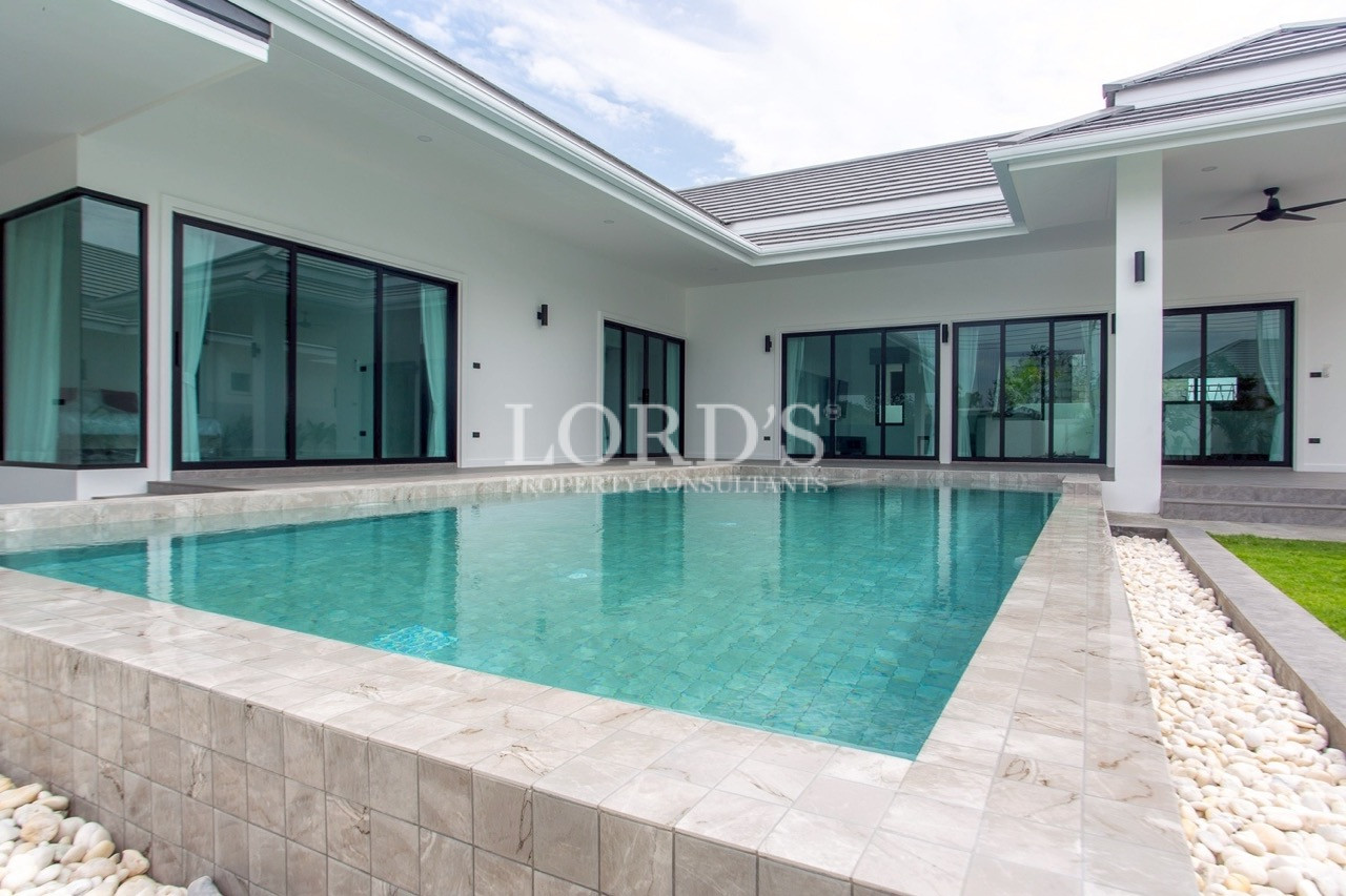 Private swimming pool beside modern villa