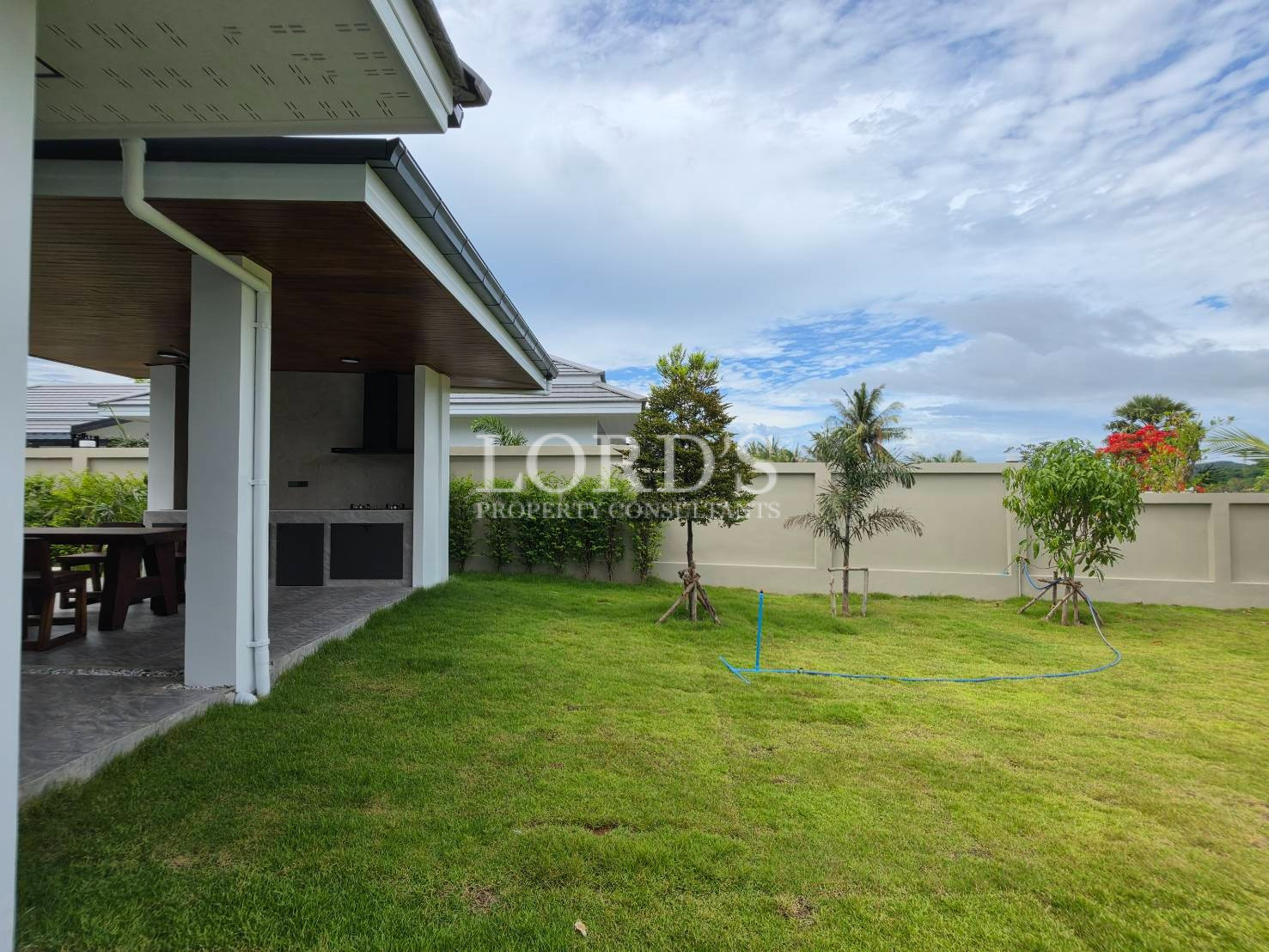 Covered walkway overlooking courtyard