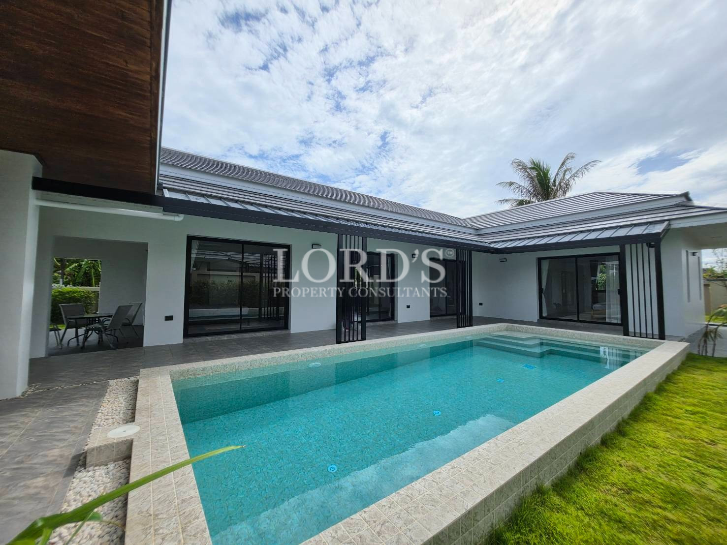 Villa exterior with swimming pool view