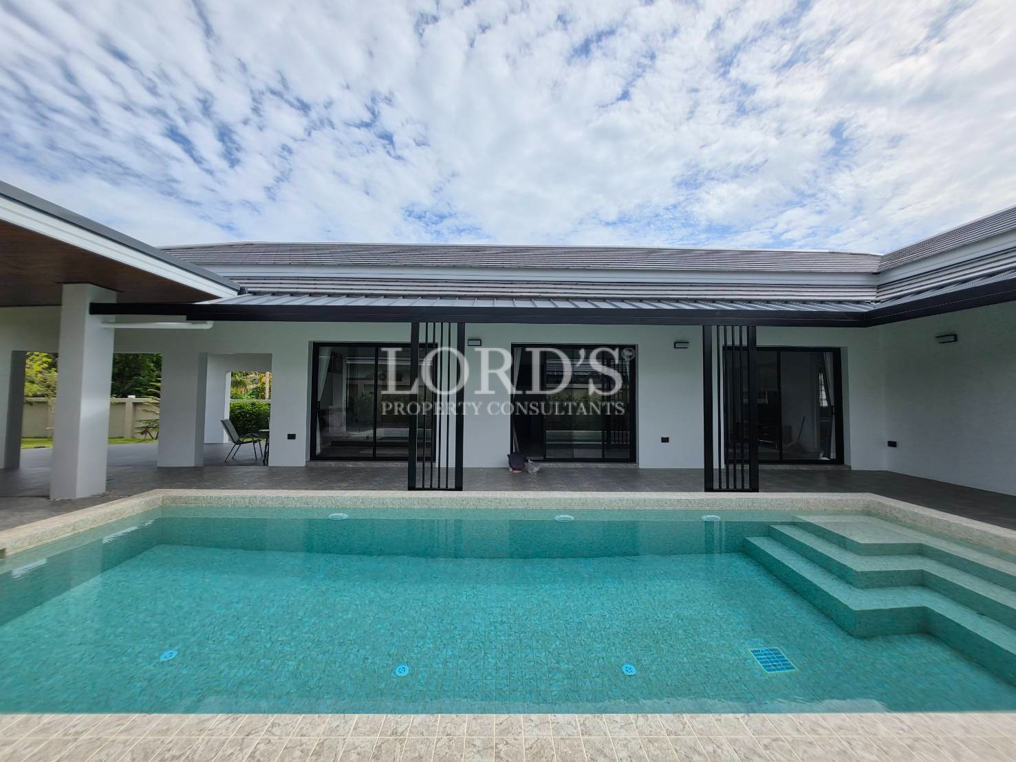 Courtyard with covered terrace and pool