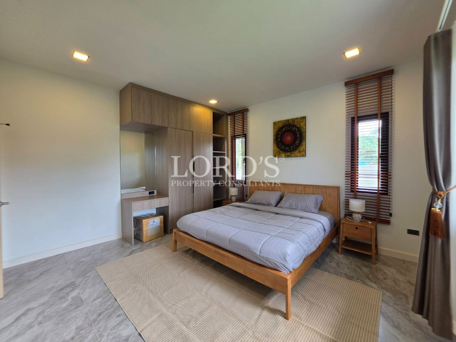 Bedroom with decorative wall feature
