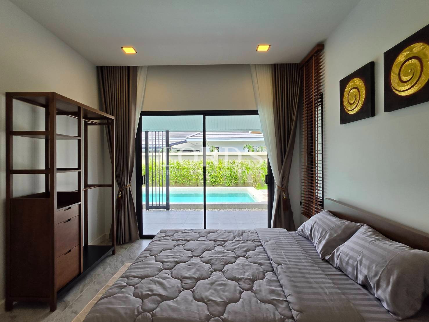 Bedroom overlooking landscaped garden
