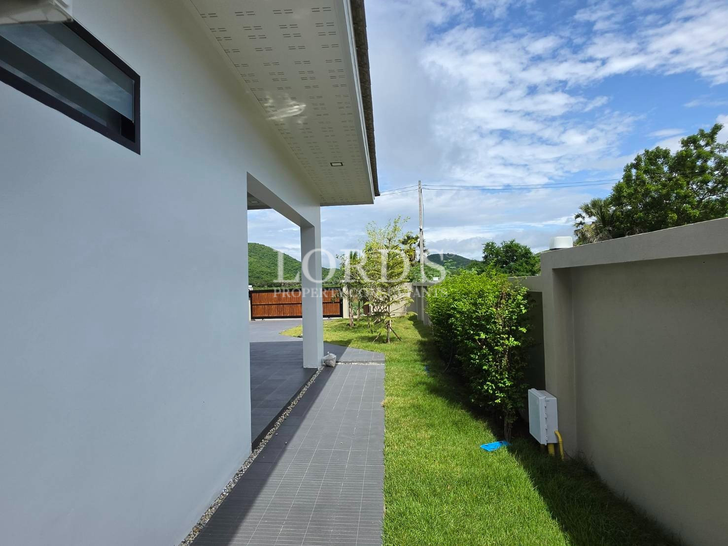 Villa exterior with garden views