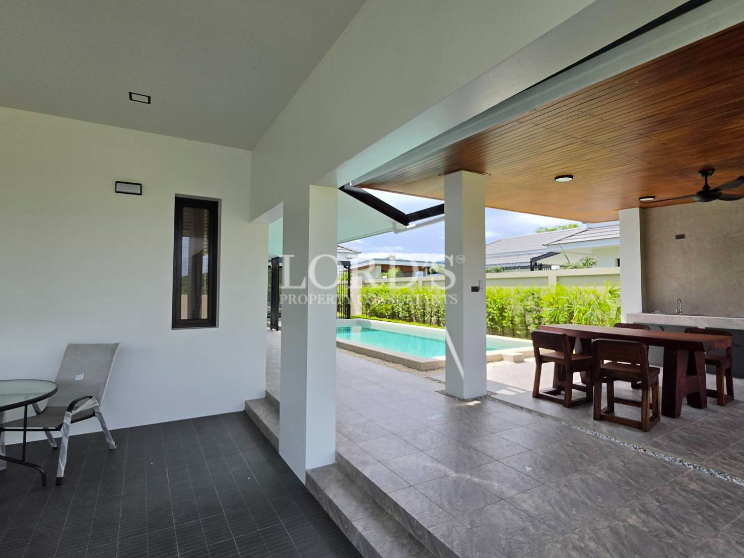Modern patio overlooking landscaped grounds