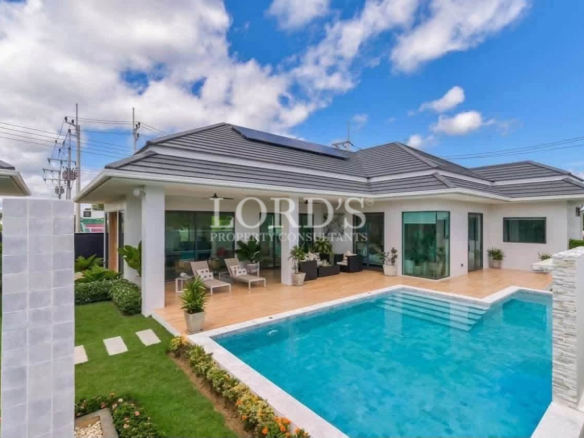 Contemporary villa with pool and covered patio