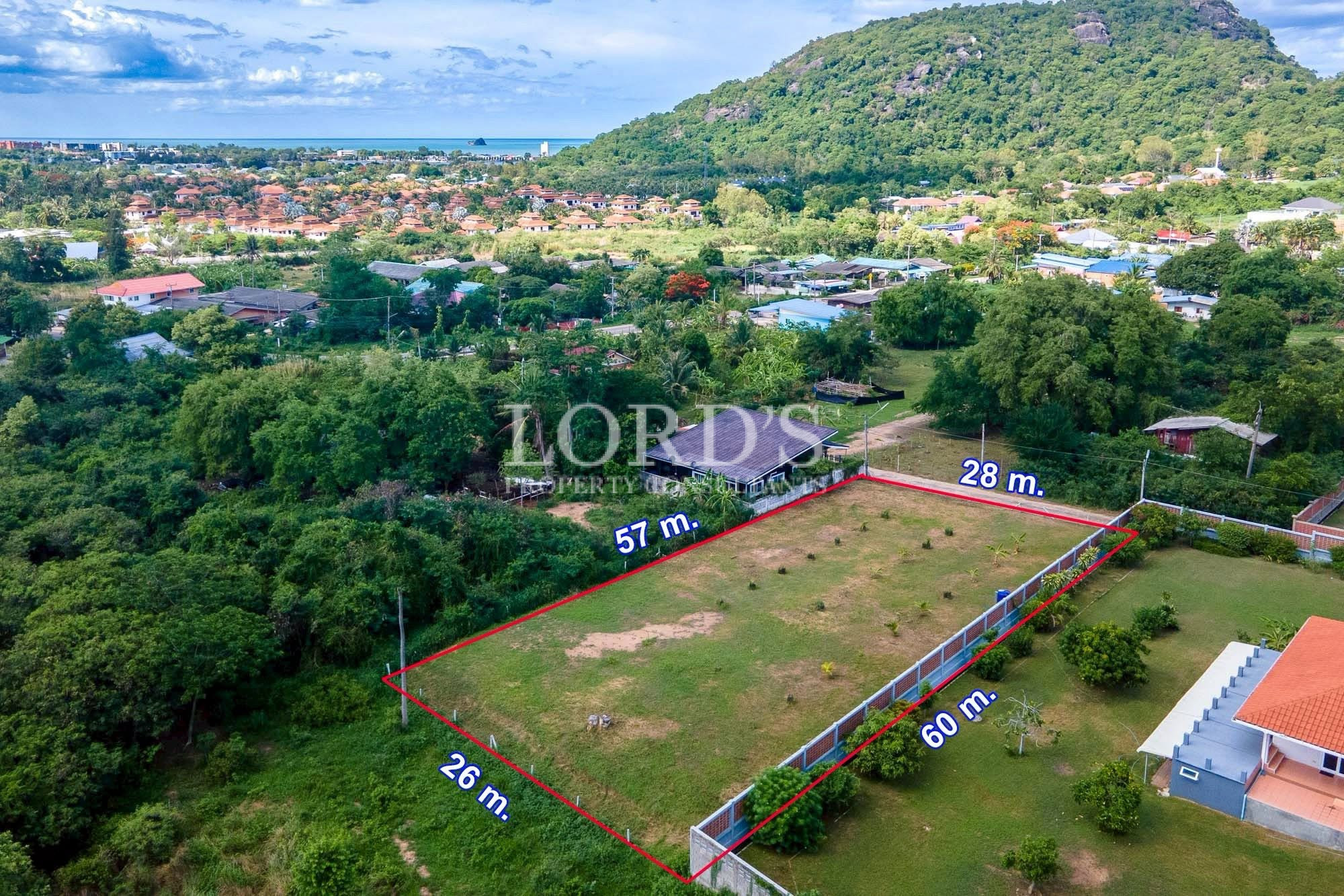 Aerial view of hillside property