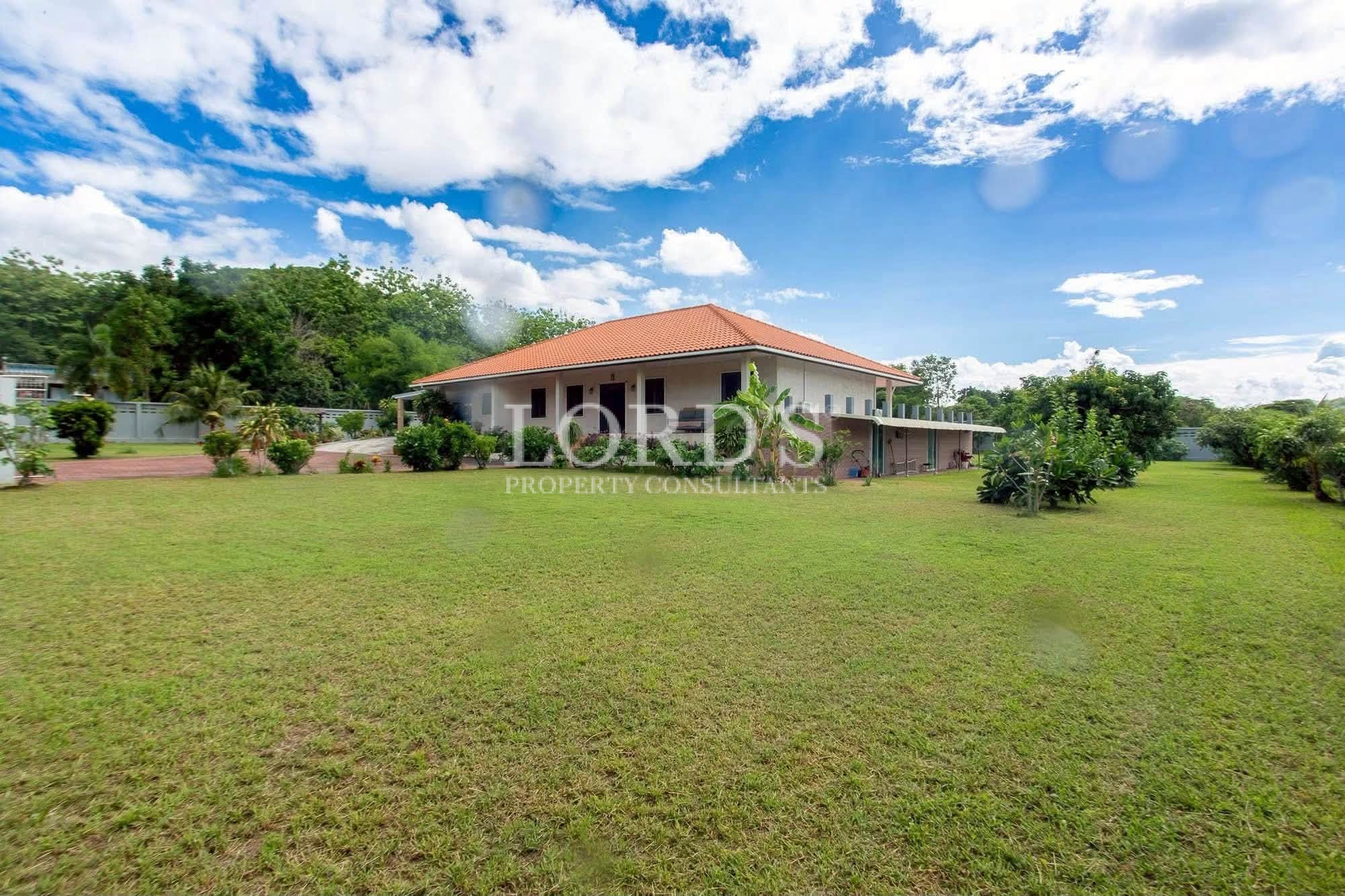 Luxury villa surrounded by landscaped lawn