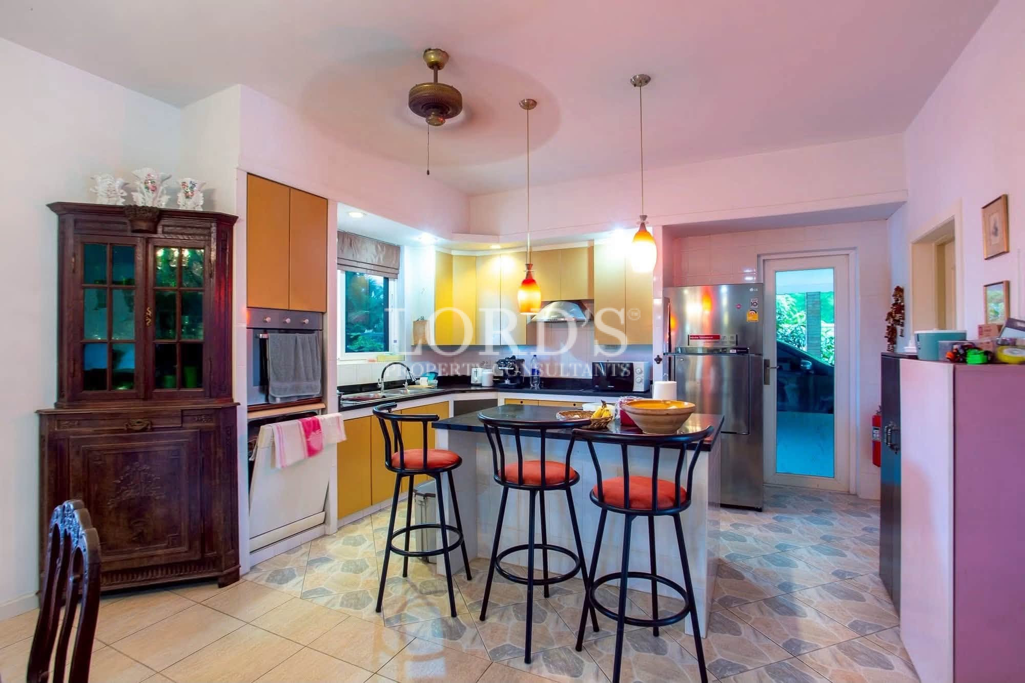 Colorful modern kitchen with breakfast bar