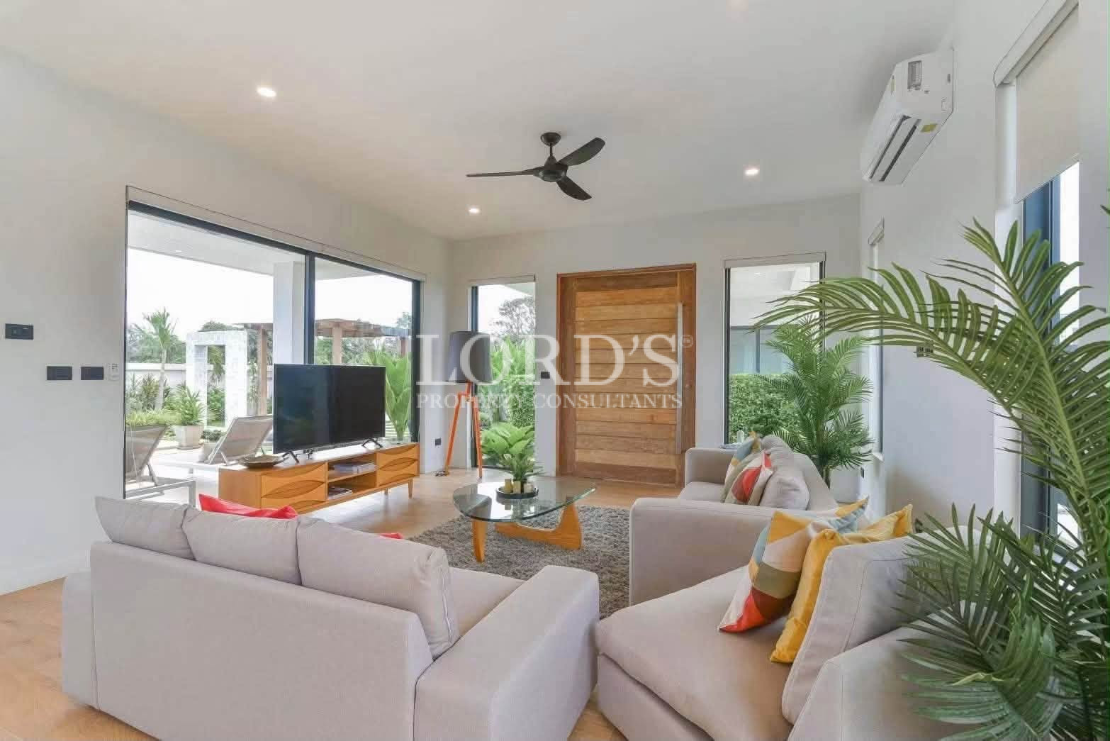 Open-plan living room with sliding glass doors