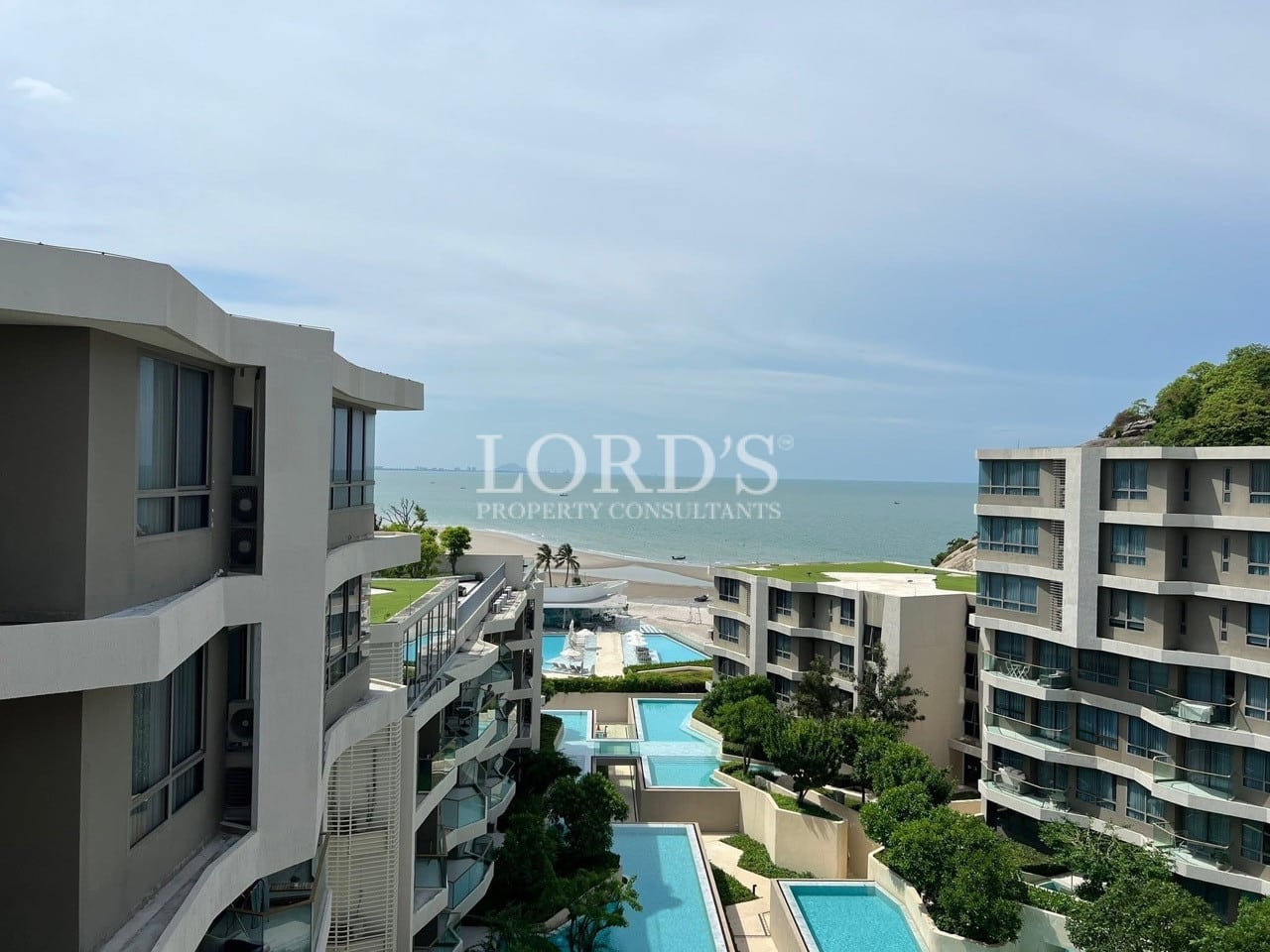 Balcony overlooking modern beachfront residences