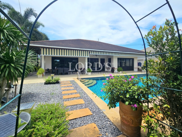 Private tropical villa with swimming pool, landscaped garden, and covered outdoor entertaining terrace