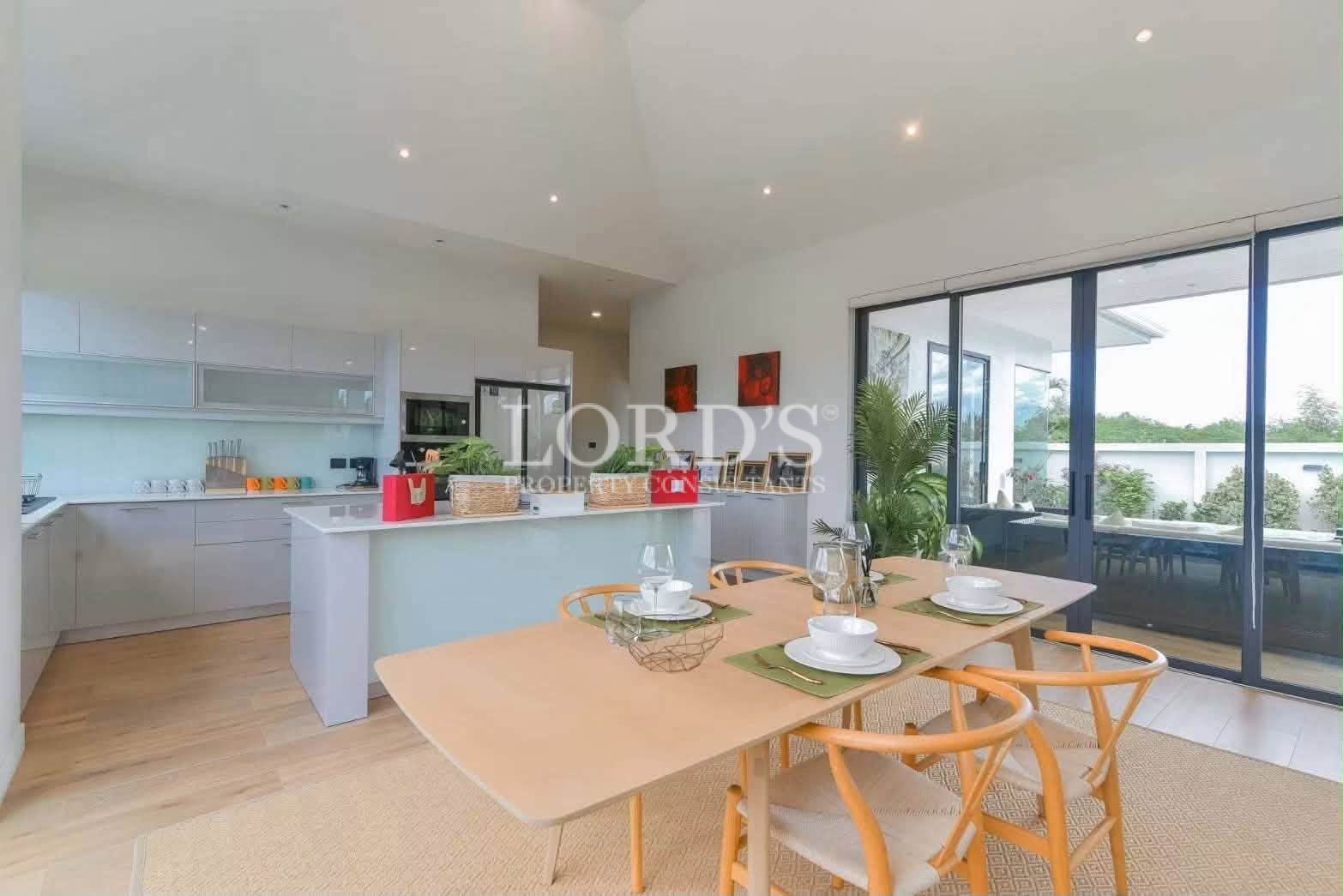 Modern kitchen with dining table