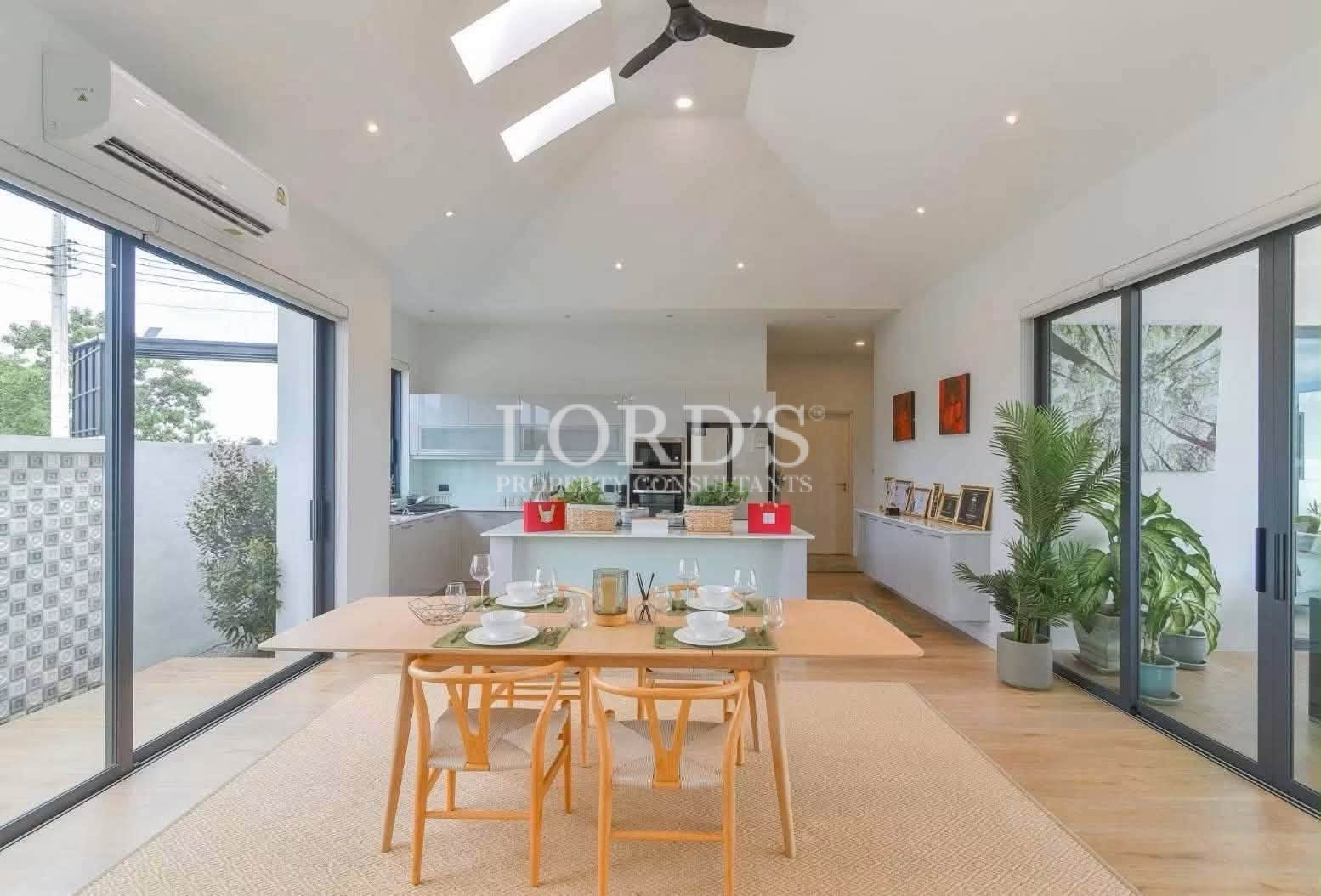 Bright dining area with modern kitchen