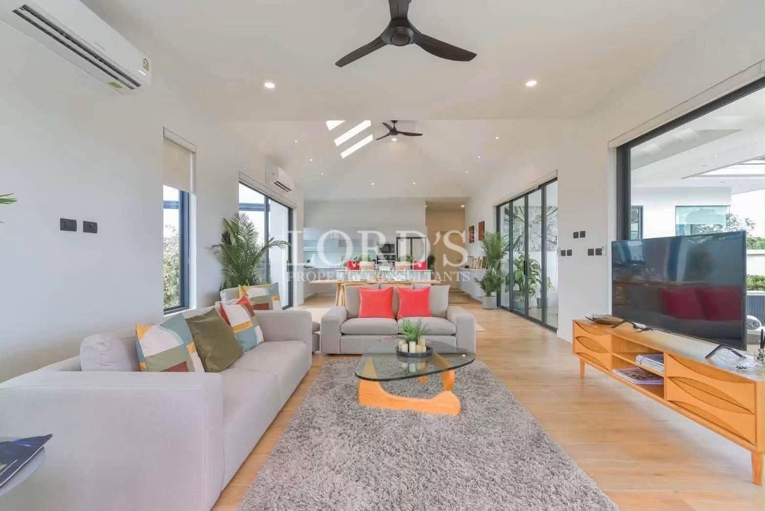 Open-plan living room with garden views