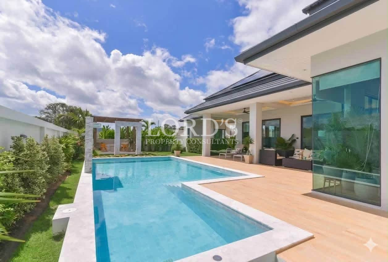 Swimming pool with covered outdoor terrace