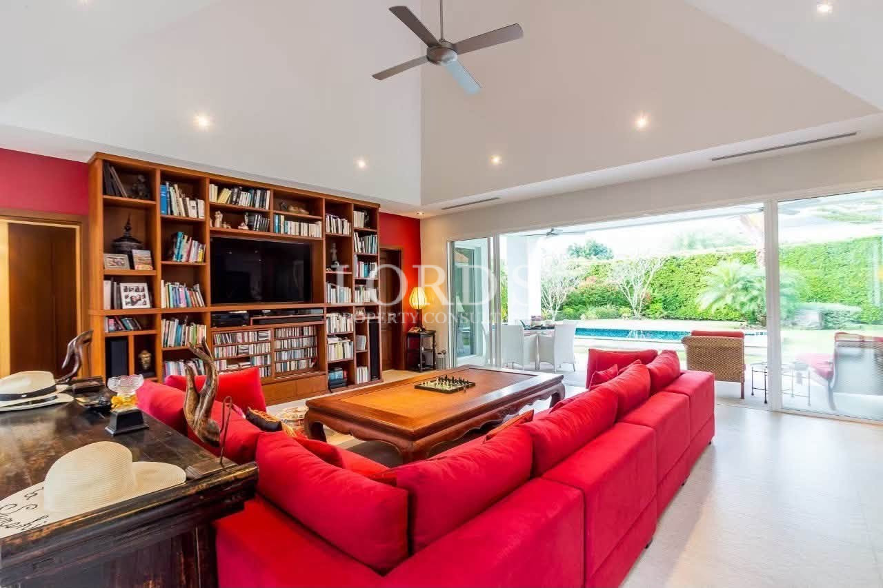 Modern living room with built-in bookshelf