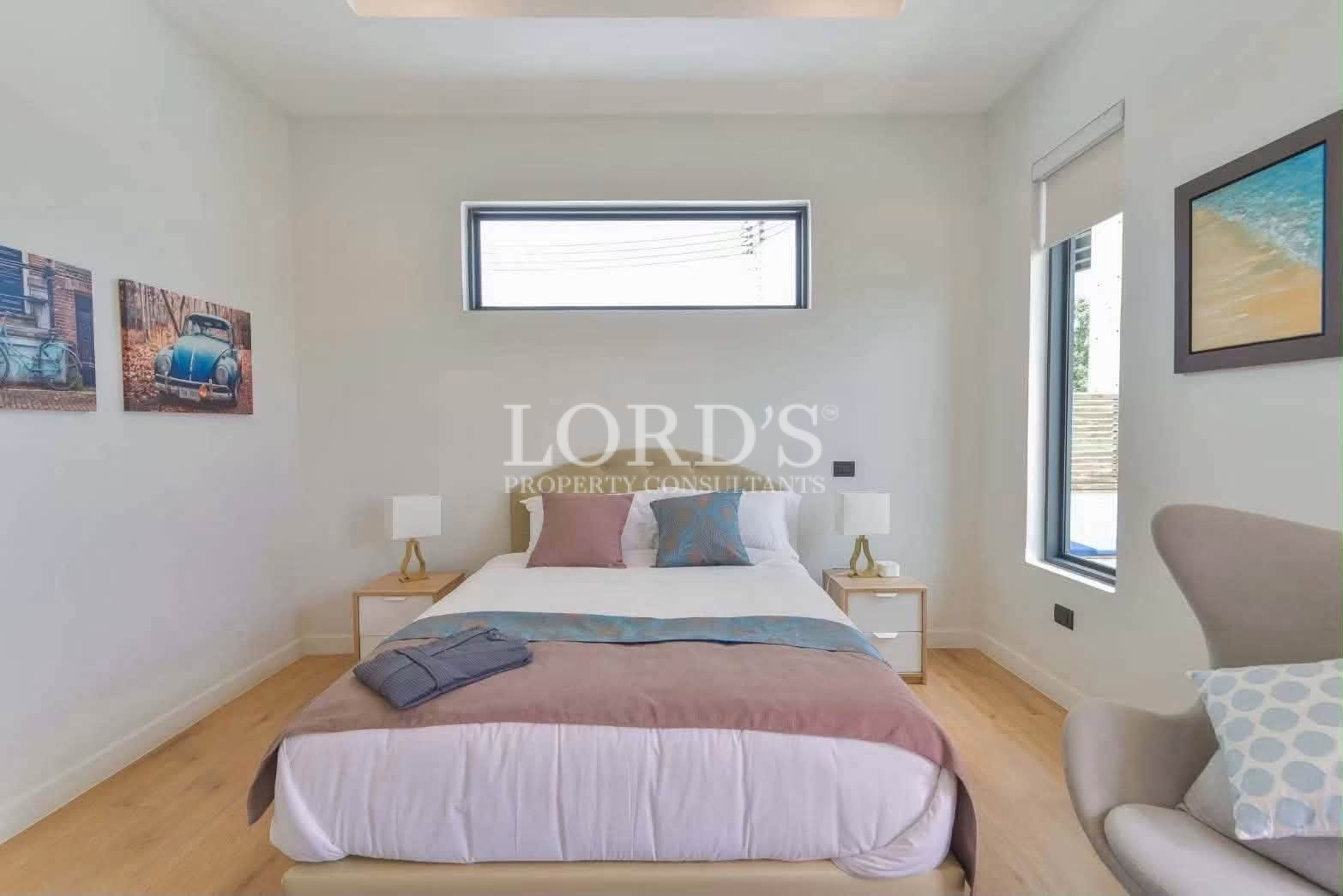 Minimalist bedroom with large window