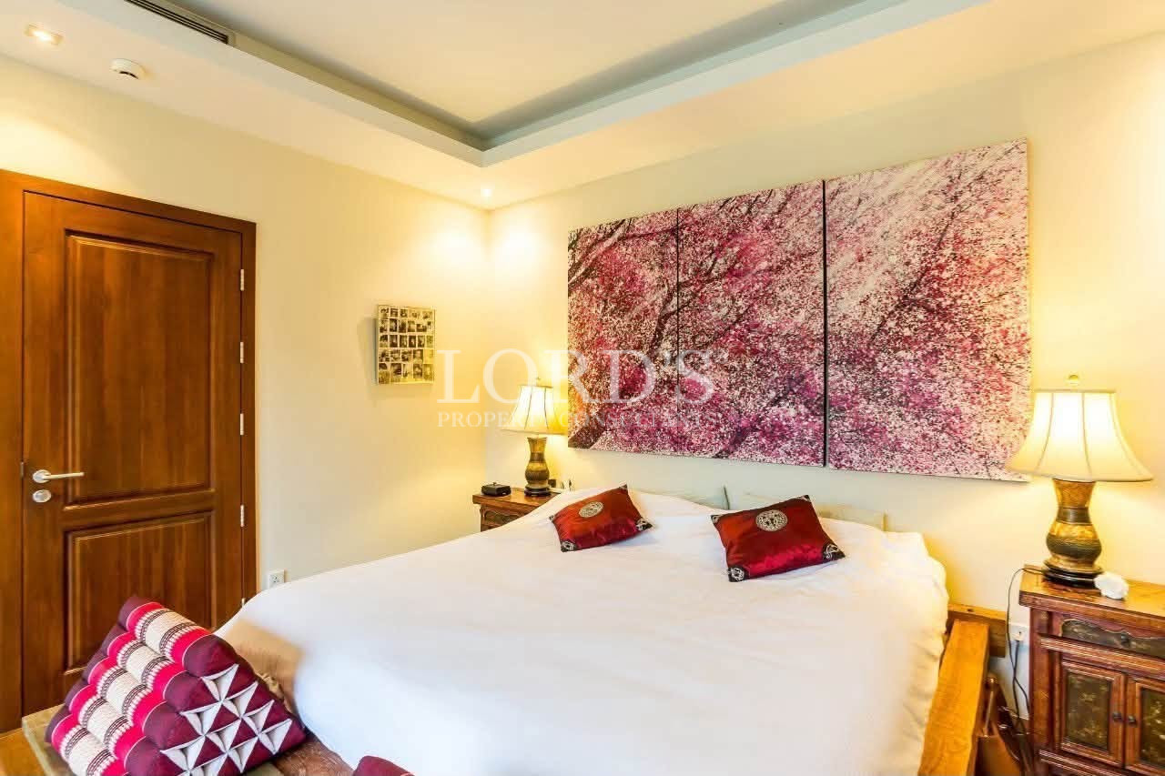 Contemporary bedroom with colorful artwork