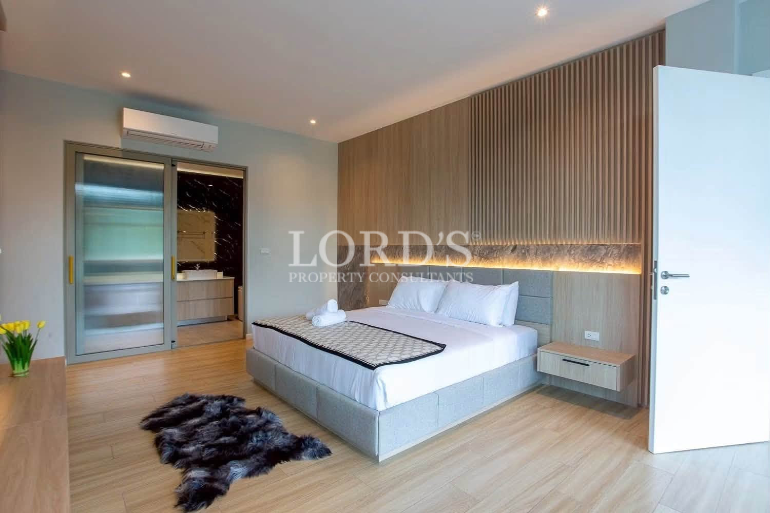 Contemporary bedroom with recessed lighting