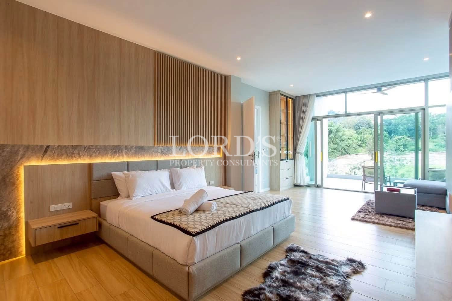 Modern bedroom with upholstered headboard