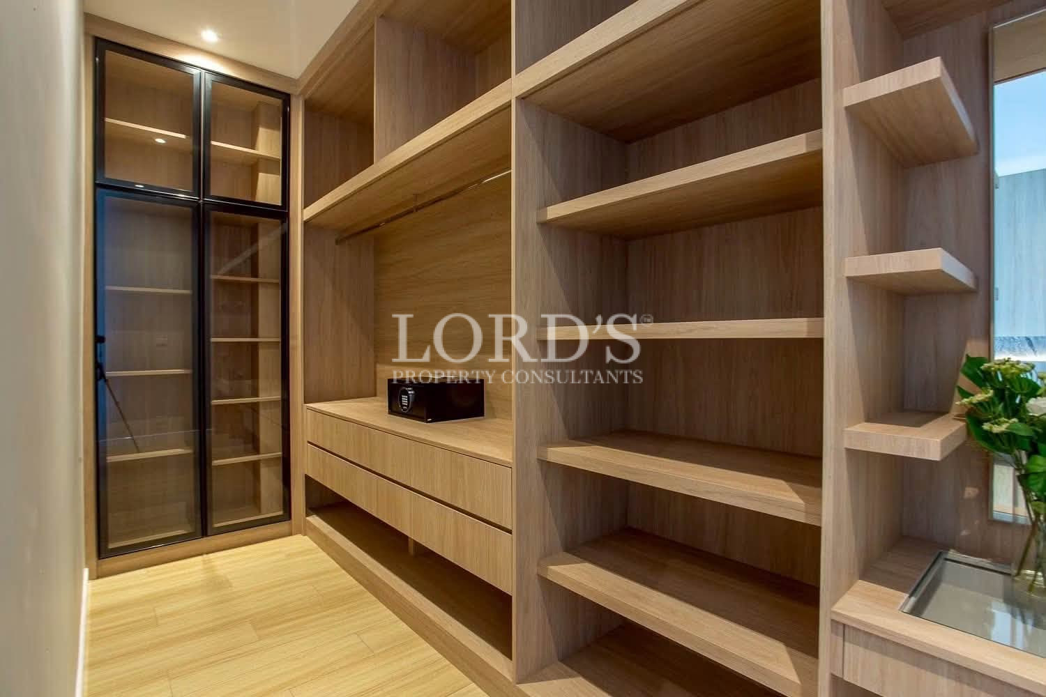 Master bedroom with wood feature wall