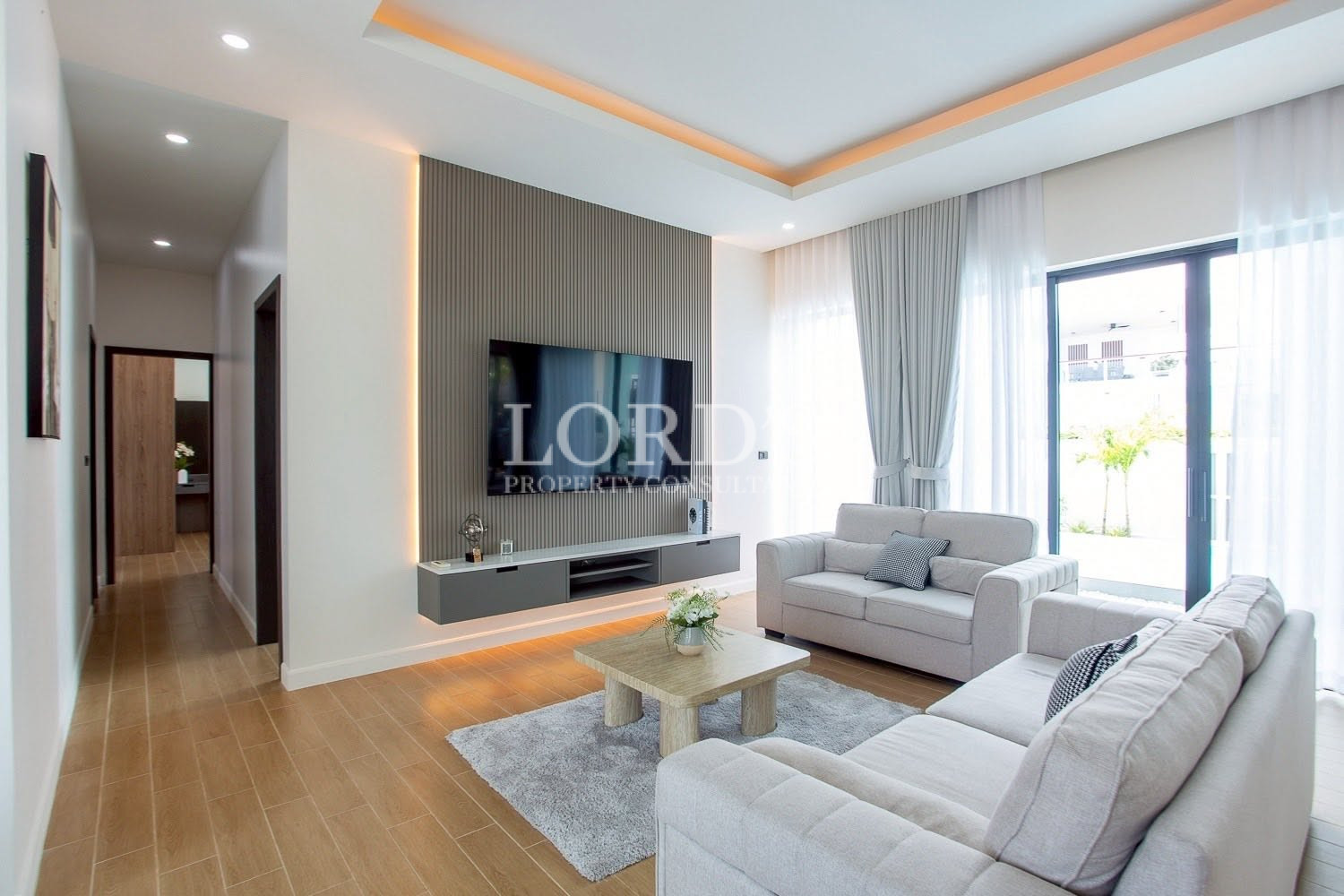Living room with built-in TV wall