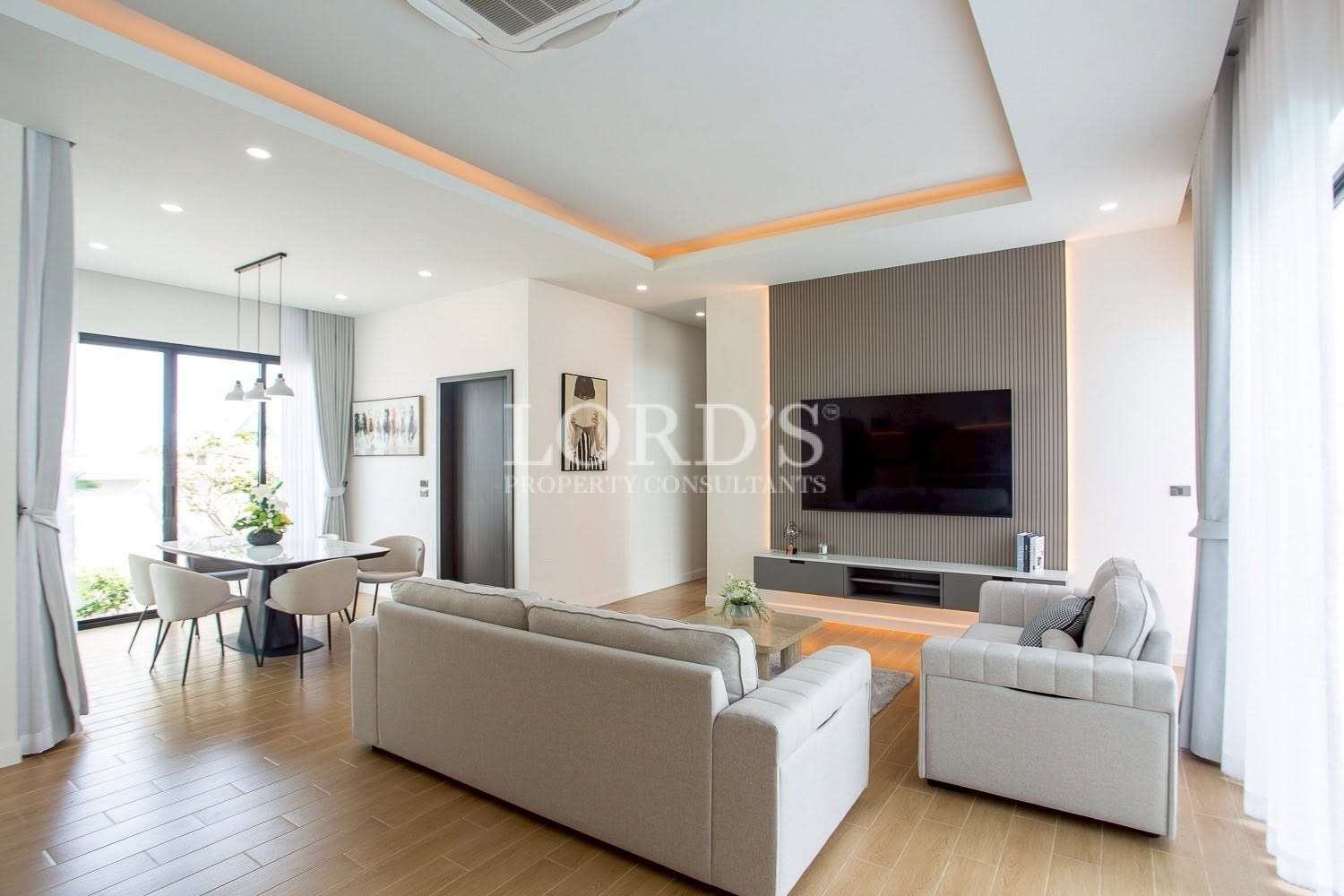 Modern living room with recessed ceiling lighting