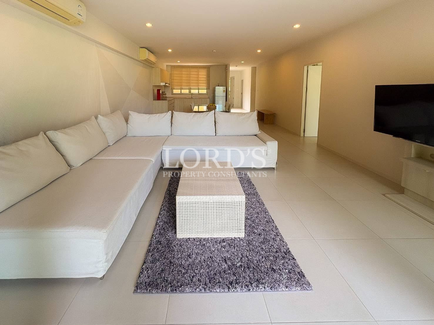Open-plan living room with sectional sofa