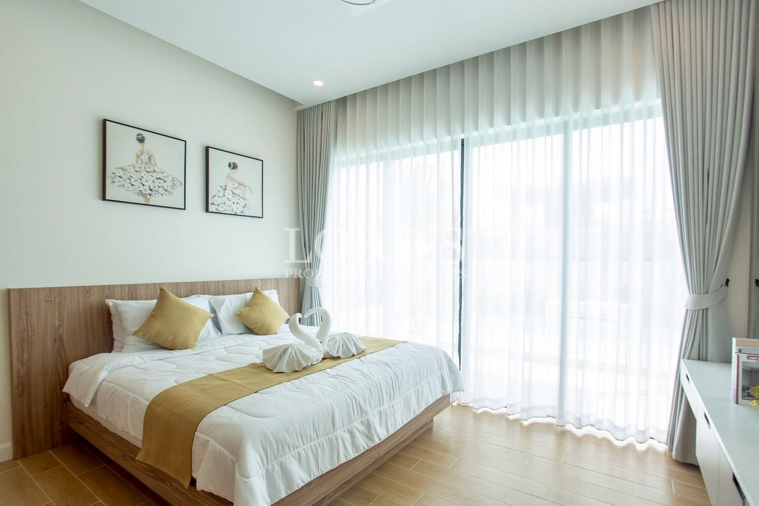 Bright bedroom with large window