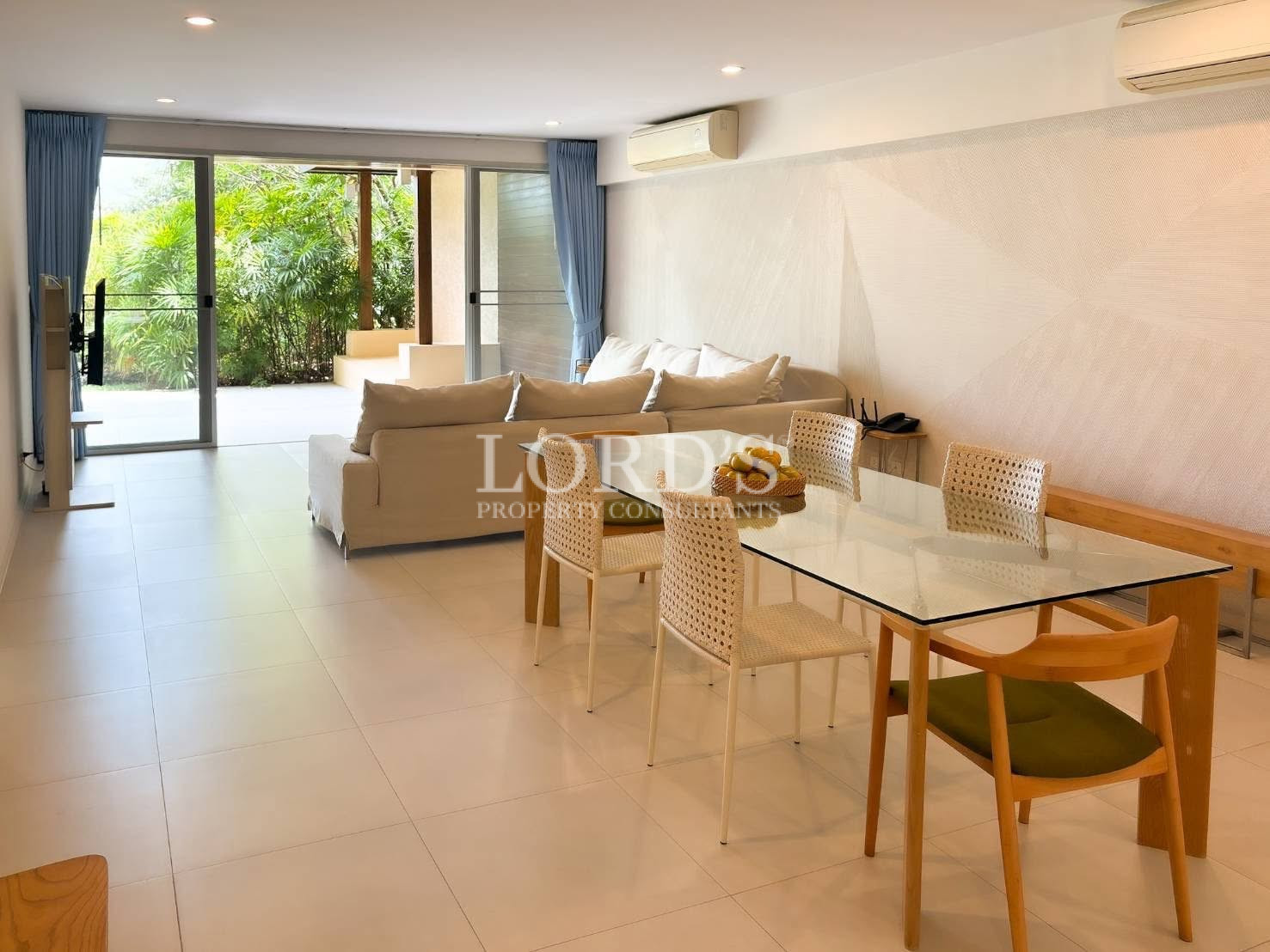 Bright living room with balcony access