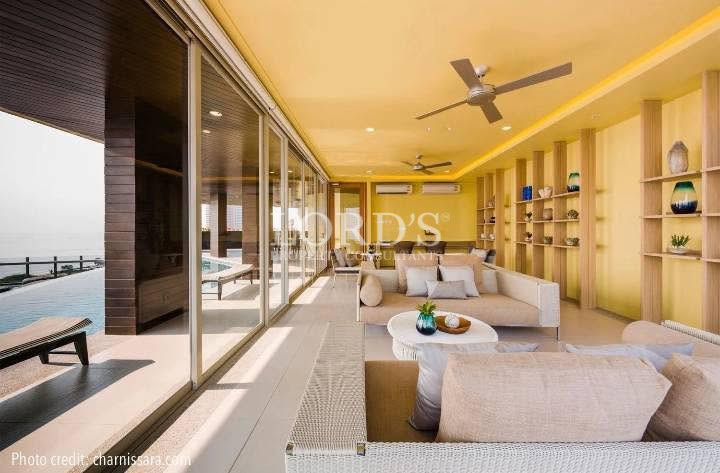 Covered outdoor corridor with wood ceiling