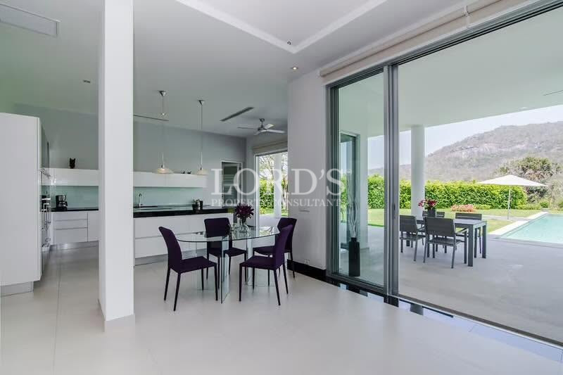 Contemporary living room with sliding glass doors and open layout