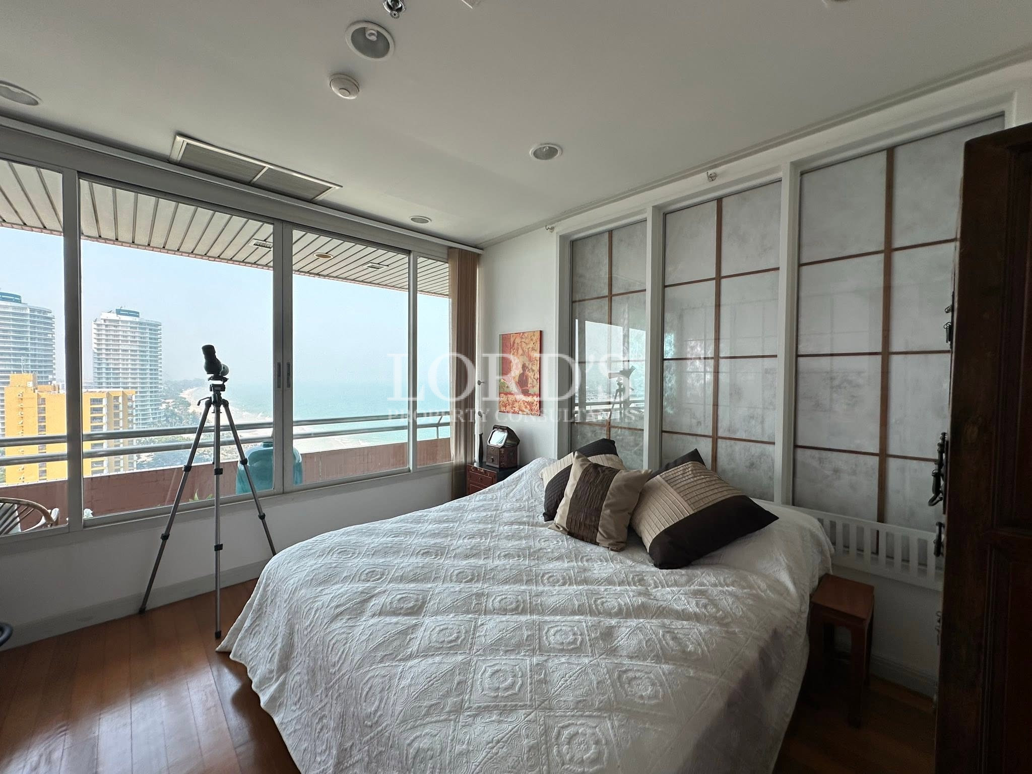 Bedroom with modern artwork