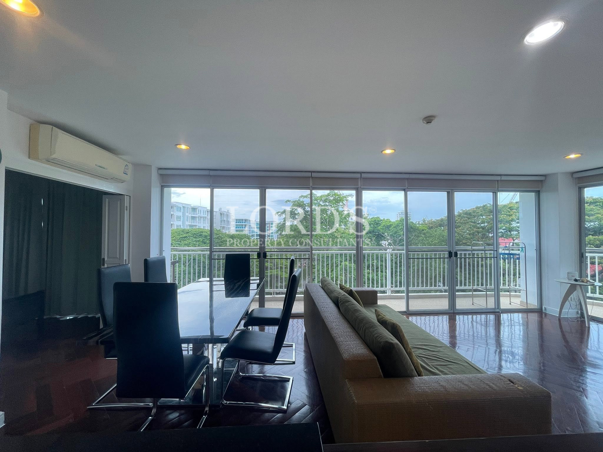 Bright living room with floor-to-ceiling windows