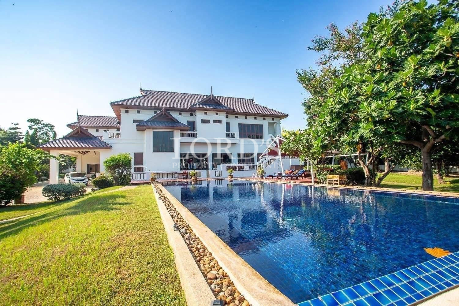Spacious luxury home surrounded by lush greenery