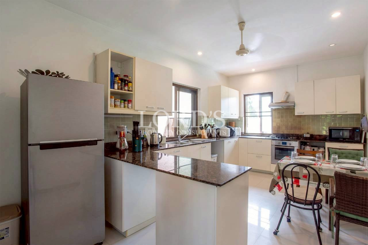 Spacious open kitchen and dining area with modern interior