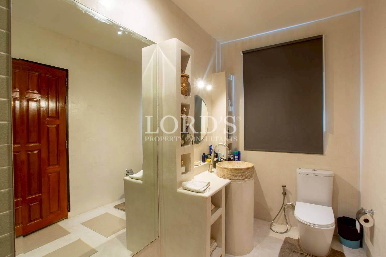 Luxury bathroom with glass shower and modern vanity