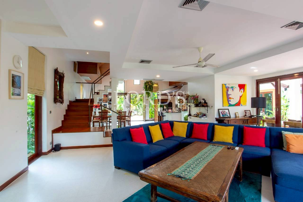 Contemporary open-concept kitchen and living area with modern décor